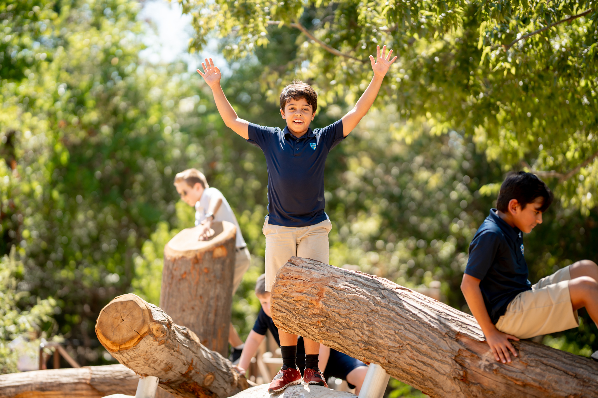 Students engaging in Nature Play